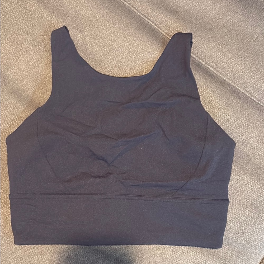 Woman’s black lululemon workout tank